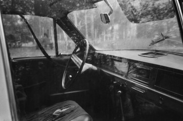 Classic car interior with reflections in the windows 
