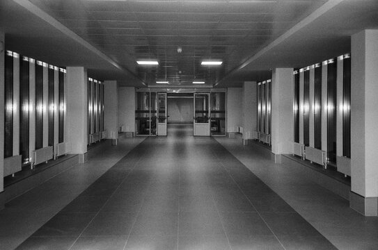 Modern underground corridor with bright lighting and sleek design