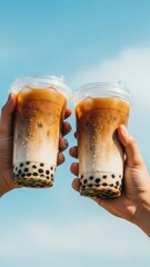 Close-up of Two Iced Cappuccino Bubble Teas with Condensation in Plastic Cups