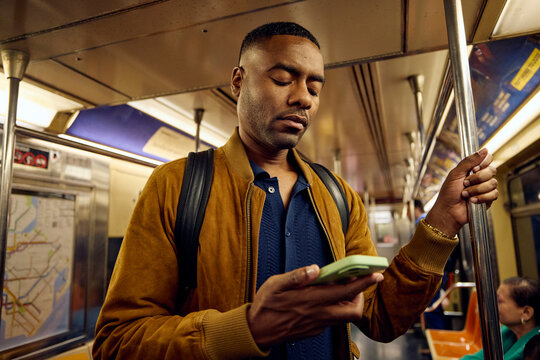 Man commuting on a city train