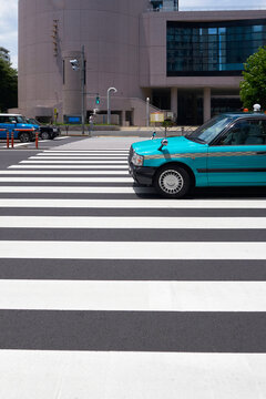 Taxi Crossing the Pedestrian Lines in a Tokyo