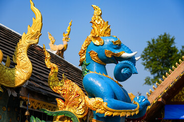 Fototapeta premium Sacred Hasadelee statue, a mythical elephant-headed bird at Wat Phra That Doi Kham temple on the mountain side of Chiang Mai, Northern Thailand