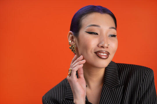 Smiling stylish woman with fashion makeup