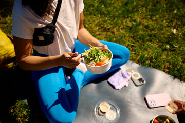 Woman enjoys a nutritious meal outside