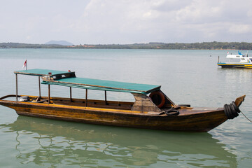Obraz premium wooden speedboat for sea transportation in the Riau Islands