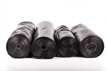 Black roll of plastic garbage bags isolated on white background. Household supply, waste disposal, cleaning product, simple packaging, essential item,  recycle, environment concept