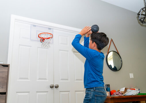 playing Basketball at Home Hoop Indoors