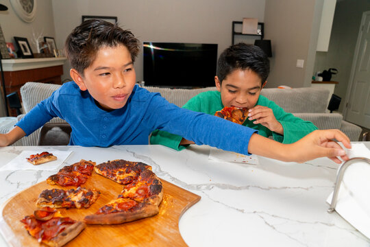 eating pizza at home
