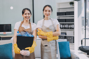 Cleaners clean empty office spaces