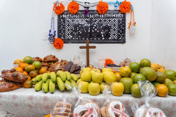 Day of the dead altar offering food and decoration