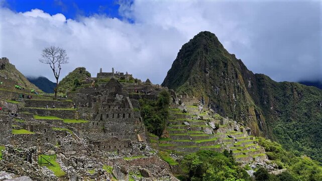 Machu Picchu circuit one morning shihuahuaco tree chihuahuaco Peru Per&uacute; aerial sunny blue sky clouds rainy season lush green jungle Huayna Picchu mountain Peruvian Andes Inca Temple Sanctuary circuit