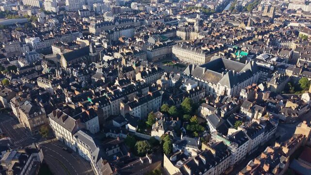 Aerial over Rennes medieval timber-frame houses, Cath&eacute;drale Saint-Pierre, Palais du Parlement de Bretagne, and granite-fa&ccedil;aded houses in Brittany's historic Centre-Ville architectural fabric, France.
