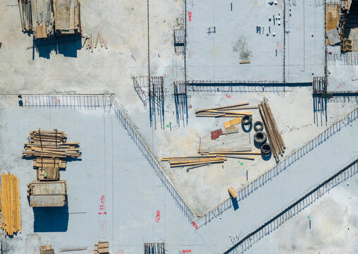 Aerial View Construction Site Concrete Slabs Steel Reinforcements.