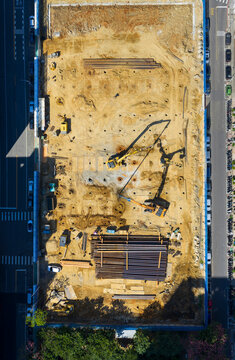 Aerial View Heavy Machinery Drilling at Construction Site