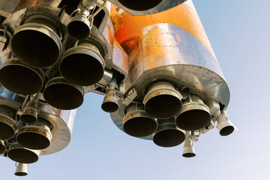 Rocket Engine Nozzles at Launch Site With Clear Sky in Background