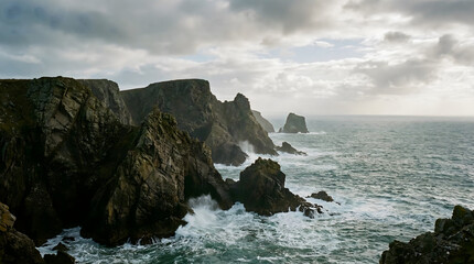 Natural rocky coastline with dramatic ocean waves and cinematic atmosphere, suitable for travel and nature background concepts.