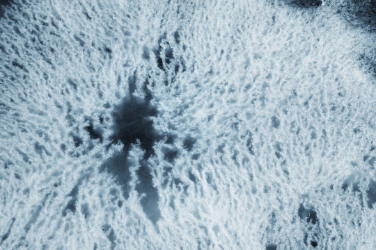 Abstract background with pattern of ice cracks under the surface