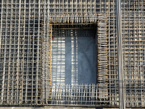 Rebar grid with large rectangular opening for a building slab