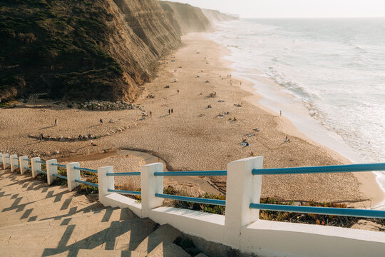 Steps leading down to Magoito Beach in Portugal