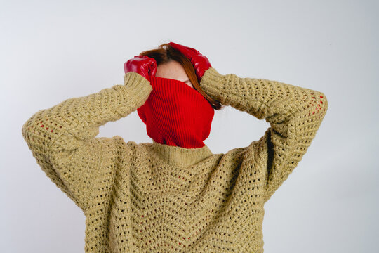 Woman in Knit Sweater and Red Gloves