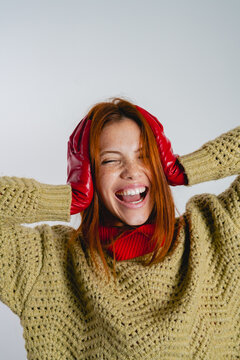 Woman in Knit Sweater and Red Gloves