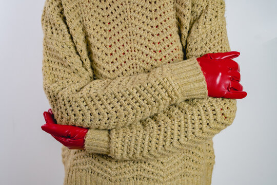 Woman in Knit Sweater and Red Gloves