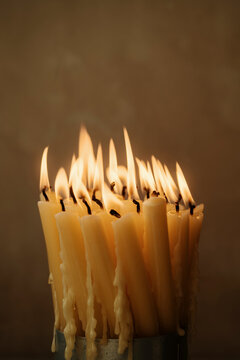 Candles Burning Brightly in a Cozy Room Setting at Night