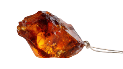 Raw amber gemstone with natural textures, featuring a wire wrap for a pendant, on transparent background