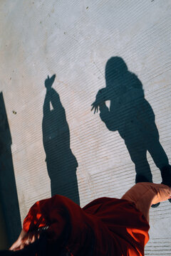 Shadows Play on a Textured Surface During Bright Daylight