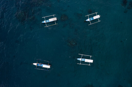 raditional Fishing Boats on Calm Sea