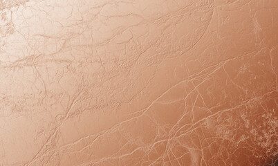 A luxurious foil texture featuring a crumpled metallic surface with fine cracks and details, creating a rich abstract background.