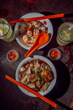 Malaysian street food: prawn noodles and pork rib noodles