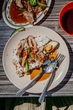 Malaysian pork leg rice with boiled egg, cucumber, and soup