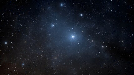 Obraz premium A luminous star cluster shines brightly in the deep dark expanse of the night sky