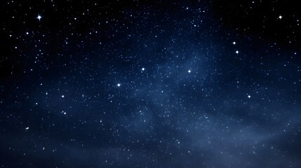 Obraz premium Vast expanse of a dark blue night sky illuminated by countless bright stars and a faint cosmic nebula