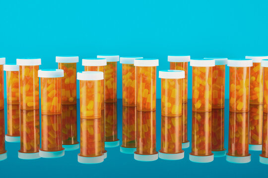 Capsule Filled Bottles with Reflection