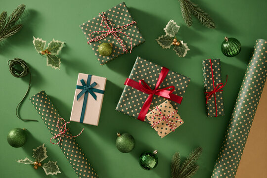 Christmas gifts wrapped in polka dot paper, adorned with ribbons