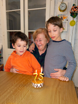 Grandmother Celebrates 75th Birthday With Her Grandchildren