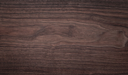Walnut wood texture background. Wide format black walnut natural texture desktop background.