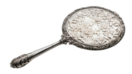 Ornate silver hand mirror displaying intricate floral carvings on its vintage handle and back, transparent background