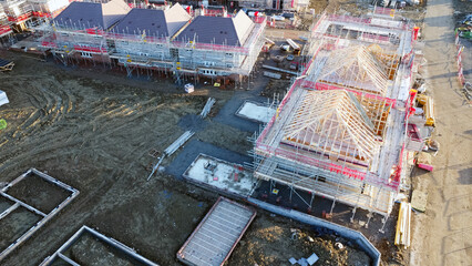 Aerial view of foundations for houses on a new housing estate UK