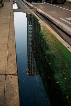 Building Reflected In the Rain Water