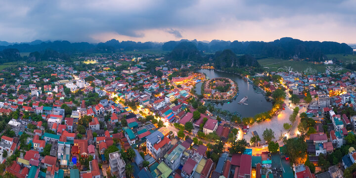 Twilight and street lights of a Vietnamese town in a mountain valley