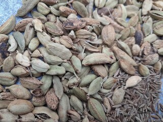Green cardamom pods culinary herbs flavor seasoning ingredient spice. Delicious Recipe helping spice dry Cardamom  