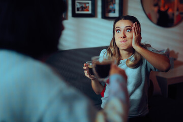 Woman Hears Incredible Gossip Over Coffee With A Friend. Surprised girl hears something unbelievable from her mom