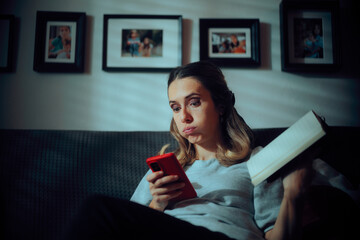 Woman Distracted by Cell Phone While Doing Something Else. Person suffers from fear of missing out checking her phone multiple times