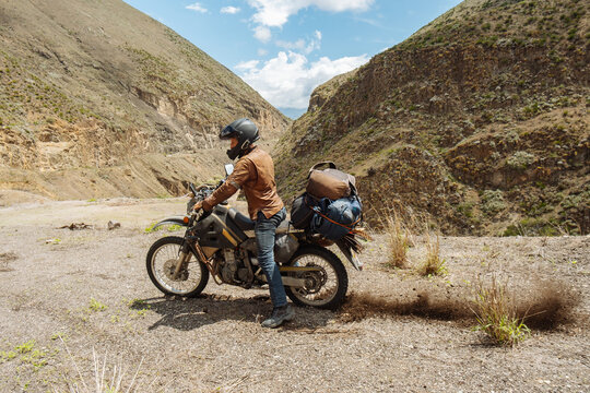 Adventurous Motorcycle Journey Through Rocky Mountain Terrain