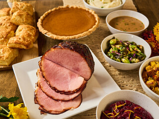 Homemade spiral ham Thanksgiving dinner spread