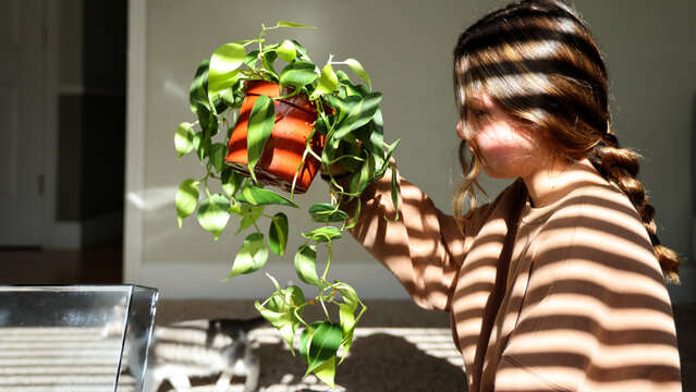 Girl and Plant