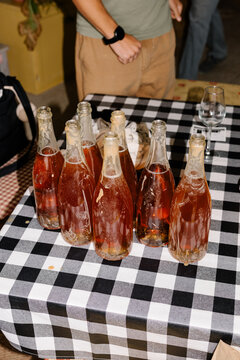 Freshly filled bottles of sparkling wine on a table